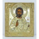Russian icon, depicting Christ Pantocrator, in a brass oklad, 12"h x 10"w