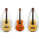 (lot of 3) Acoustic guitar group, consisting of a cased six string acoustic guitar, 30"h,