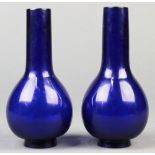 (lot of 2) Chinese blue Peking glass stickneck vases, each with a long slender neck above a pear