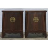 Pair of Chinese small lacquered cabinets, each fronted by a pair of hinged doors and with a