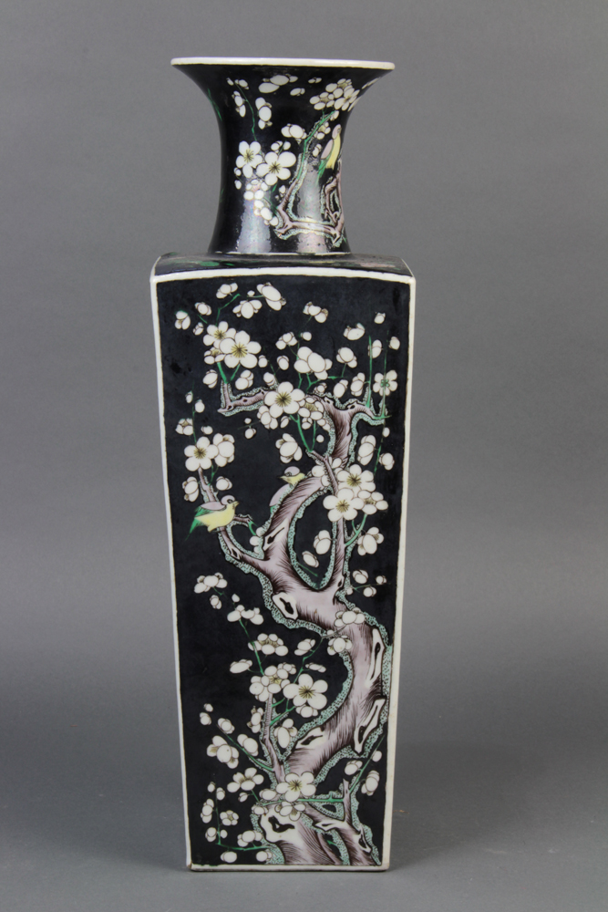 Chinese famille noir porcelain vase, with a trumpet neck above a tapering square sectioned body