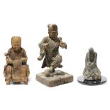 (lot of 3) Chinese sculptures: first, a stone carved luohan; the remaining two of wood, with one