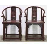 (lot of 2) Chinese red lacquer horseshoe back armchairs, the contoured back splat carved with