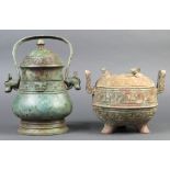 (lot of 2) Chinese archaistic bronze vessels: one lidded ding, with zoomorphs on the lid, and the