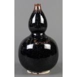 Chinese oil spot glazed ceramic vase, of double gourd form raised on a short foot, recessed base