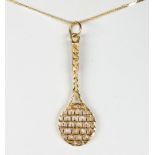 14K yellow gold tennis rackets pendant-necklace Featuring 1) 14k yellow gold racket, measuring