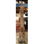 Large African carved wood Ibo, Nigeria sculpture, depicting a standing female with stylized