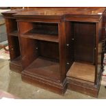 Georgian style mahogany bookcase, executed in three parts, having adjustable shelves and rising on a