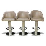 (lot of 3) Art Deco style bar stools, each having a swivel seat above the chrome base having a