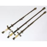 (lot of 3) Fraternal swords, the scabbards and hilts ornately decorated with applied brass mounts,