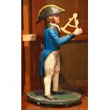 Maritime polychrome decorated figural sculpture of a midshipmen