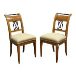 Pair of Biedermeier ebonized and birch dining chairs circa 1820