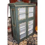 Continental hand painted glass door cabinet circa 1860, having two doors with floral reserves