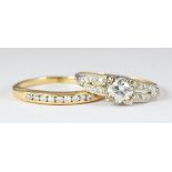 (Lot of 2) Diamond and 14k yellow gold rings Including 1) ring, centering (1) transitional-cut 0.