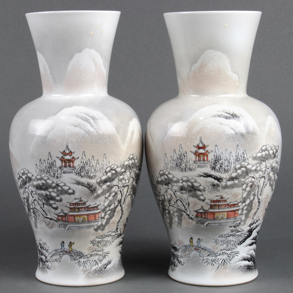 Pair of Chinese enameled porcelain vases, of a snowy landscape with figures and pavilions,