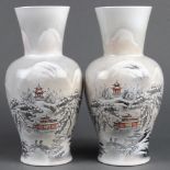 Pair of Chinese enameled porcelain vases, of a snowy landscape with figures and pavilions,
