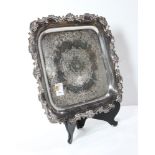 International silverplate serving tray in the "Essex Manor" pattern, the square plateau framed by