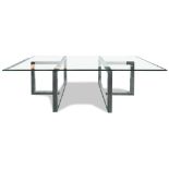 Modern polished steel and glass dining table