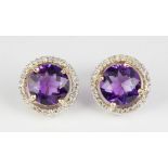 Pair of amethyst, diamond, 14k white and yellow gold earrings