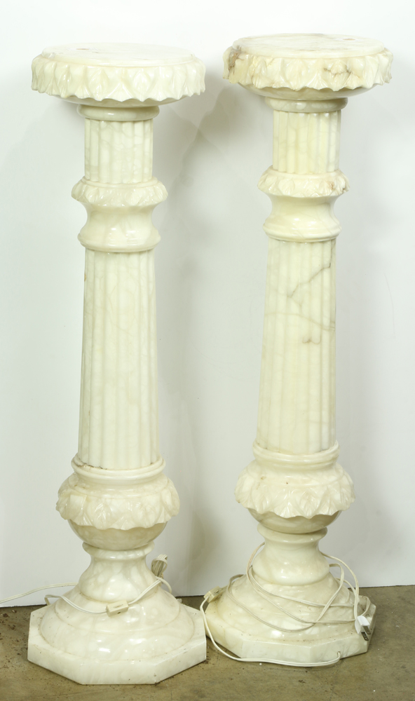 Pair of Victorian style variegated pedestals, each having a circular top. 37"h x 10"w