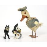 (lot of 3) Vintage cartoon cinema figurines, conisting of a German 1930's porcelain bisque Minnie