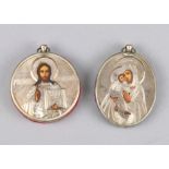(lot of 2) Russian traveling icons, each having a silver oklad, one depicting the Mother of God, the