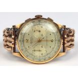 Mundus 18k yellow gold and metal wristwatch Dial: round, silvered, Arabic numeral, dot gold tone