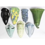 (lot of 7) Assorted art pottery ceramic wall mount pockets, of various form and decoration, makers