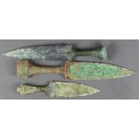 (lot of 3) Dongson bronze daggers, two with plain handles, and one with a pierced open work garlic