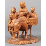 Japanese wood sculpture of tsuge wood, a woman and two boys riding on a horse, led by a smiling man,