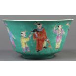 Chinese enameled porcelain turquoise bowl, featuring children at play, recessed base with a