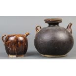 (lot of 2) Vietnamese brown glazed ceramic ewers, Tran dynasty: one with a ovoid body, and one