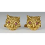 Pair of ruby, 14k yellow gold owl cufflinks