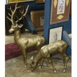(lot of 2) Patinated metal figural sculptures depicting deer, the buck gazing outward, the doe
