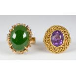 (Lot of 2) Amethyst, jade and yellow gold rings Including 1) nephrite cabochon, 14k yellow gold