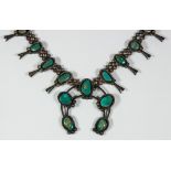 Native American turquoise and silver squash blossom necklace