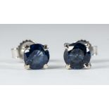 Pair of sapphire, 14k White gold earrings Featuring (2) round-cut sapphire, weighing a total of
