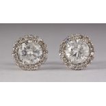 Pair of diamond and 18k white gold earrings