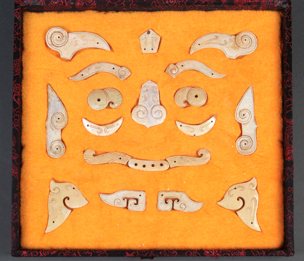 Set of 19-piece Chinese archaistic stone mask, with facial features including eyes, nose and