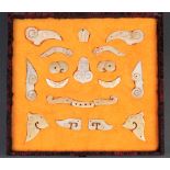 Set of 19-piece Chinese archaistic stone mask, with facial features including eyes, nose and