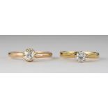 (Lot of 2) Diamond, yellow gold and platinum rings Including 1) ring, centering (1) round