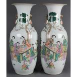 Pair of large Chinese enameled vases, of a group of beauties and children in a garden, with one