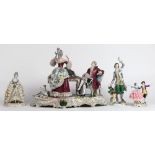 (lot of 4) Continental crinoline figural groups, each depicting a classically dressed figure, the