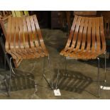 Pair of Norwegian Hans Brattrud for Hove Mobler stacking dining chairs circa 1958, each with
