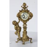 German gilt metal mantle clock, fashioned with a figure of Cupid