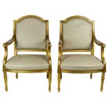 Pair of giltwood carved fauteuils