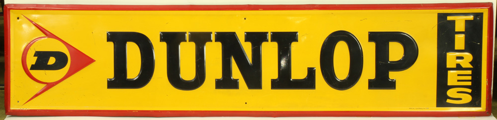 Dunlop tires embossed tin horizontal sign