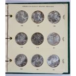 (lot of 15) American Eagle silver dollars in an album, dates 1986-2000