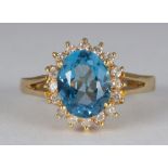 Blue topaz, diamond, 14k yellow gold ring