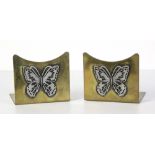 Pair Art Deco brass bookends with silver applique butterflies